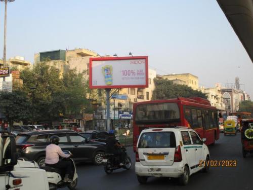 Outside-Bansal-Sweets-Pitampura-towards-NSP20x10-Unipole-Front-Lit